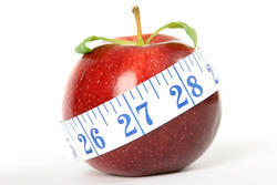 apple and measuring tape