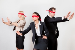 blindfolded business people