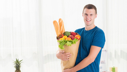 man with groceries