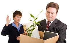 Man with his belongings leaving a job