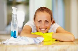 Woman taking a break from cleaning