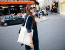 Woman using things she already owns to make a tote bag