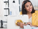 Woman learning how to sew